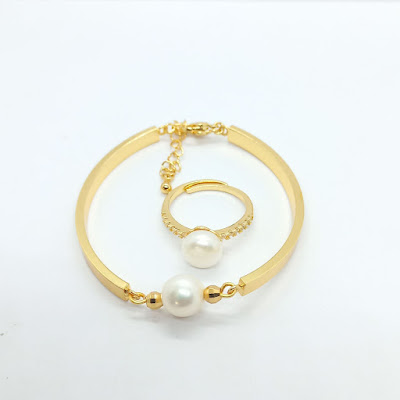 Kilau (luster) pada mutiara dan cara menilainya